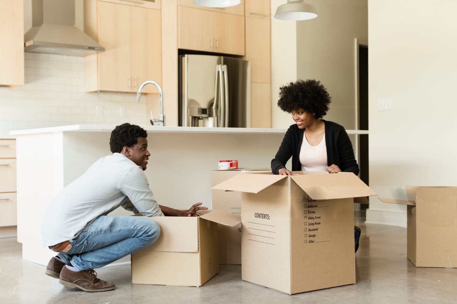 Boxes and movers unpacking
