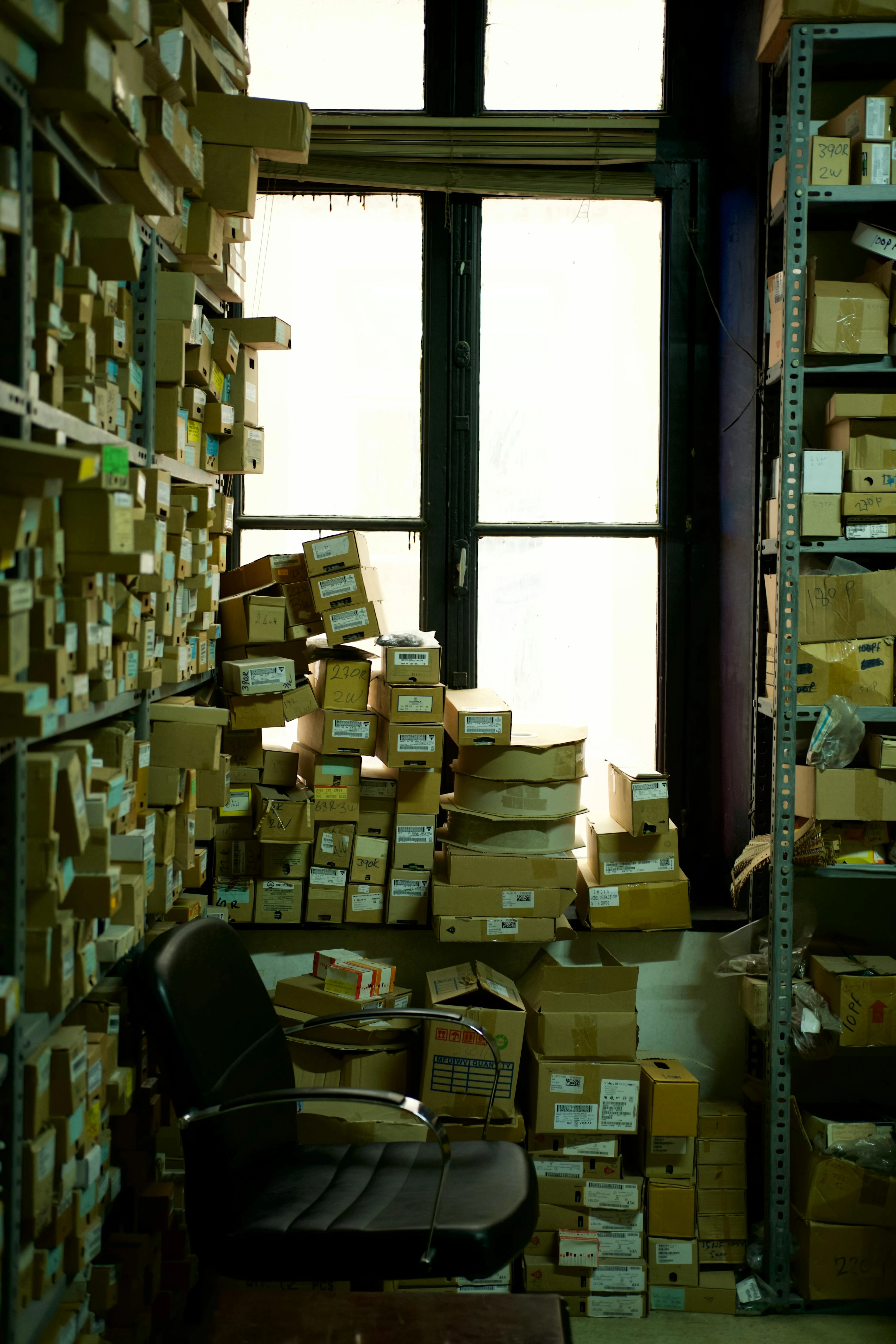 Warehouse with stacked secure storage crates